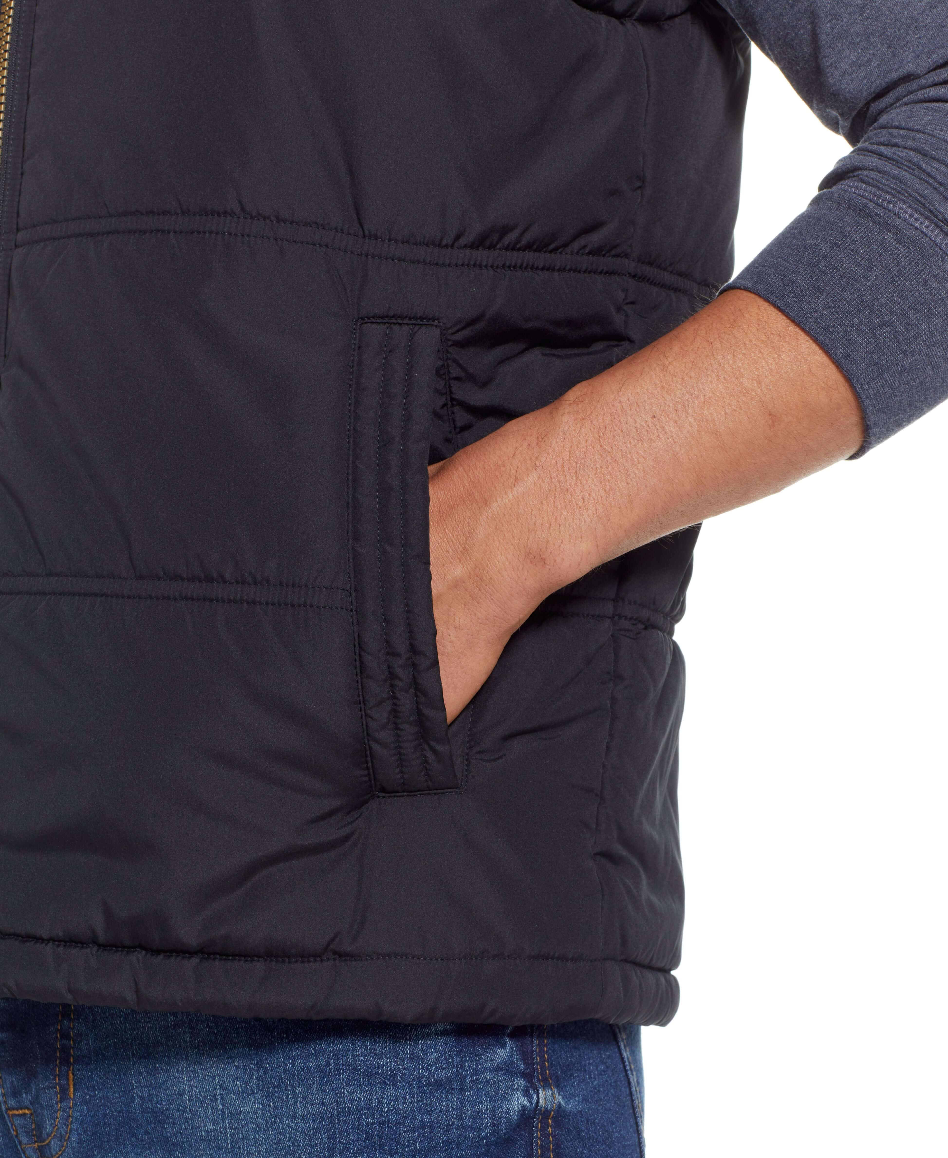 Sherpa Lined Hooded Puffer Vest In Black